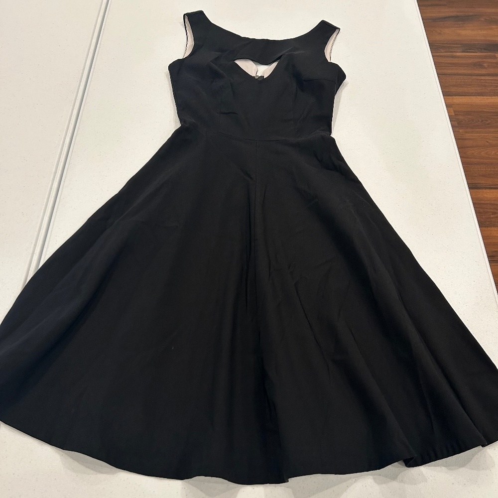 Very cute black half circle dress with cutout at bodice